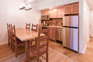 Dining room table seats 5, plus a fully equipped Kitchen.