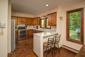 Kitchen with space for two at the counter.