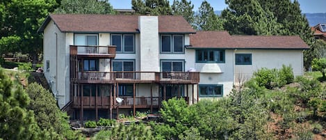 View of back of 3 1/2 story Home on hillside