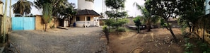 Panoramic view of the house from inside private grounds