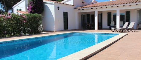 Back view of villa, sun terrace and pool