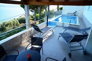 Swimming pool (3 m wide and 7 m long) and main terrace area