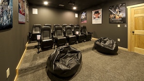 Home theater with 
movie theater seats for 11.