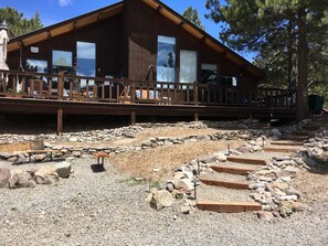 FRONT VIEW WITH FIRE PIT ON LEFT