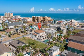 Aerial view of the property. Conveniently located less than a 1/2 block from the beach!