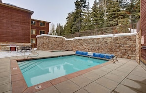 Outdoor heated pool, hot tub, and heated pool deck