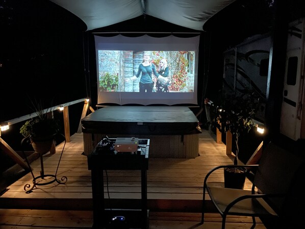 In the evenings relax with our new outdoor movie theater.