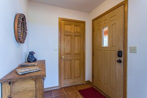 Lovely front entrance with a large coat closet.