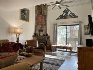 Living Room Fireplace and Leather Chair for reading or watching TV.