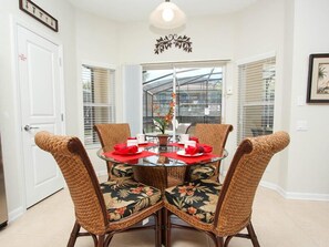 Breakfast nook with view of pool