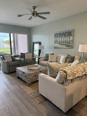 The living room has very comfortable and ample seating. 