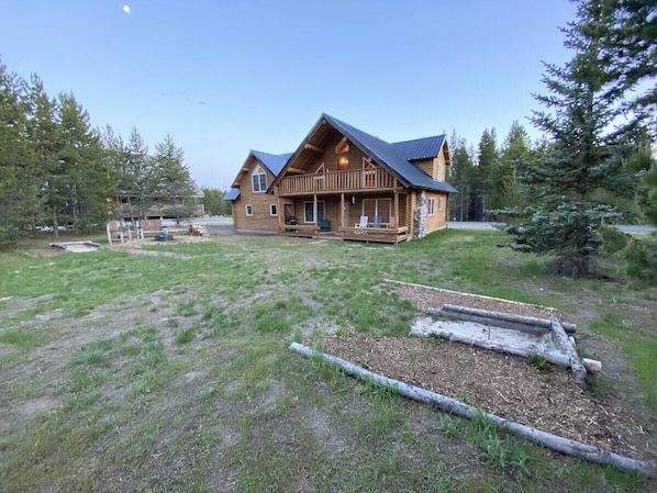 Surrounded by tall fragrant pines and expansive greenery, the beautiful cabin is a great place to get away from it all.