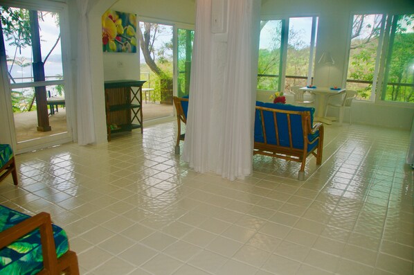 Living areas connected by two six foot wide archways