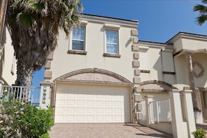 The townhome has parking for 4 vehicles.