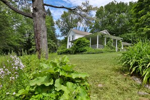 Lots of trees and flowers on the property
