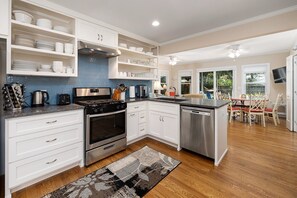 View of Kitchen towards back den area and back door