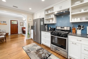 View of kitchen and front door