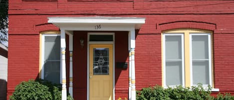 Comfortable turn of the century renovated row house by the river and downtown.