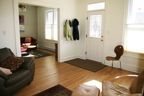 Second front parlor with desk and gas fireplace