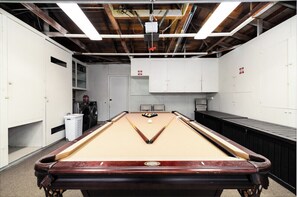 An inviting space for families to bond over a game of pool, making memories that last a lifetime