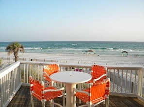 Walk off your private deck into white sands of the Gulf.