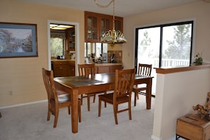 Dining room can seat 8 easily and enjoys great views.