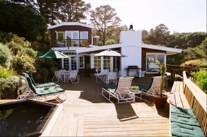 large outdoor deck off of living room and dining room