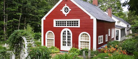 Front of house with antique french church doors