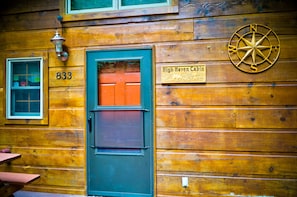 The front door with our sign.  The compass is symbolic of your path and arrival.