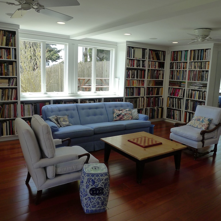 Fully stocked library and living room in one of the best cabin rentals in Massachusetts!