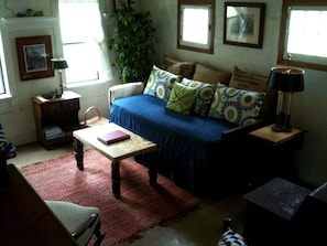 living room w/day bed & trundle - the mighty  woodstove keeps it cozy in winter