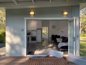 One bedroom apartment styled home with full kitchen in living and large deck 