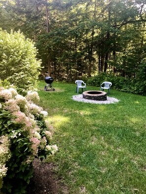Weber Charcoal grill (Spring through Fall Only) & Masonry fire pit.