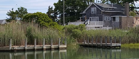 This property has 2 shallow water docks and a boat launch on  a salt marsh creek