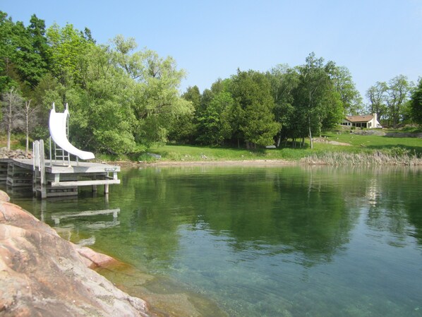 view from the point of the dock beach and house