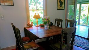 French doors lead you from kitchen to the screened in porch