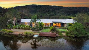 Mystique from the back of the house at dusk facing the lake
