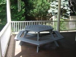 Picnic table on the front porch