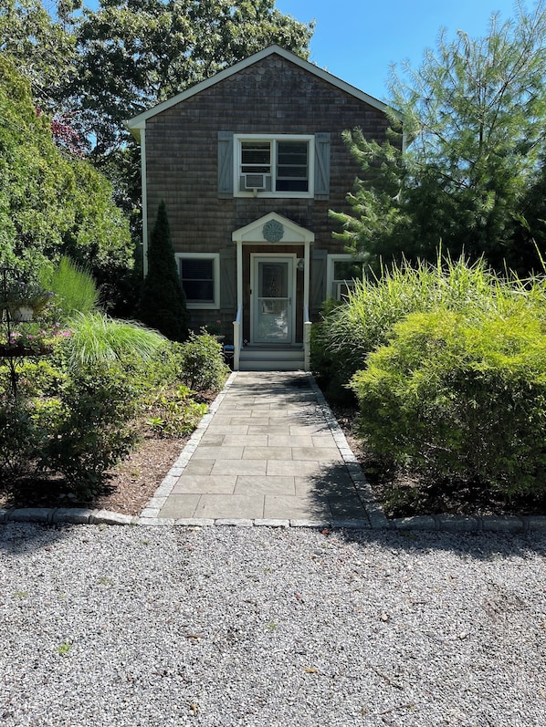 The entrance to the house is welcoming and the foliage inspiring.