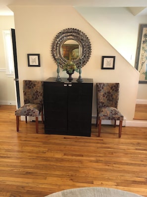 The view of the bar with chairs opposite the sofa