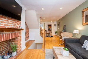 Steps lead to in-unit w/d and half bath