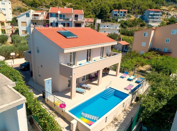 **** star holiday villa for max 10 people, with heated pool & fenced courtyard.