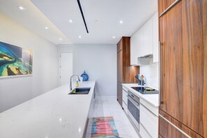 Imagine whipping up breakfast in this beautiful modern kitchen!