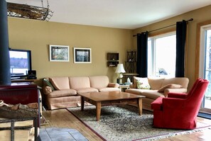Main living room with satellite TV and WIFI, and great views of Buck Lake