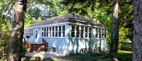 Tucked in among mature pines on Lake Michigan is a community of Vintage Cottages