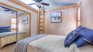 Queen bed with loft and clerestory windows (with blinds) for star gazing.