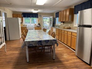 Kitchen equipped to feed large families with two fridges