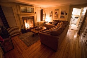 cozy living room with working fireplace (supply your own wood)