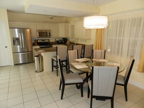 Regal Beach #613 - Dining Area & Kitchen