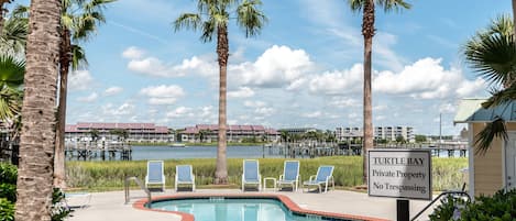 Community pool with access to fishing dock.